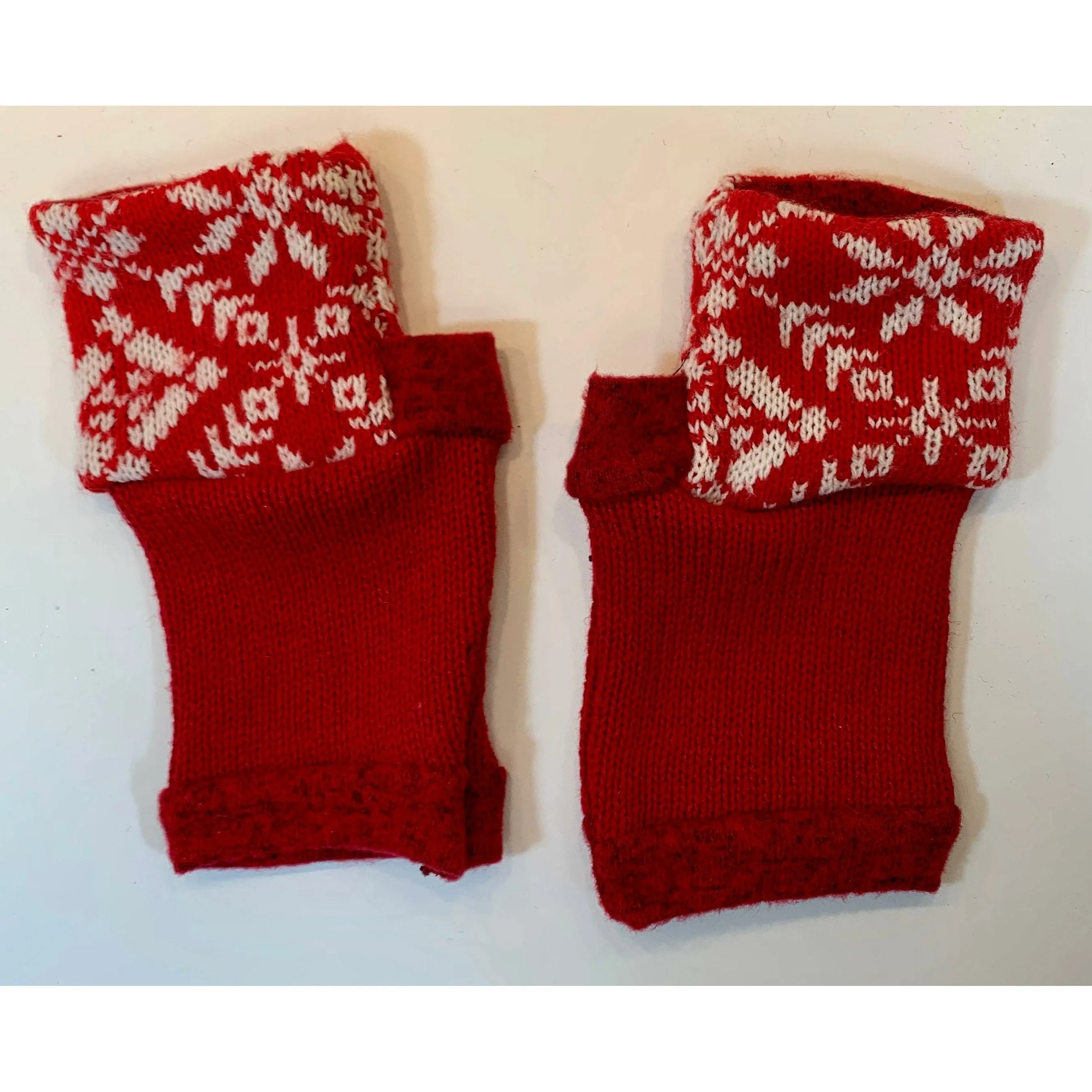 Recycled Scandinavian pattern sweater fingerless gloves in reds with embroidered snowflake. Wear for fun, school, cashiers, fingers free.