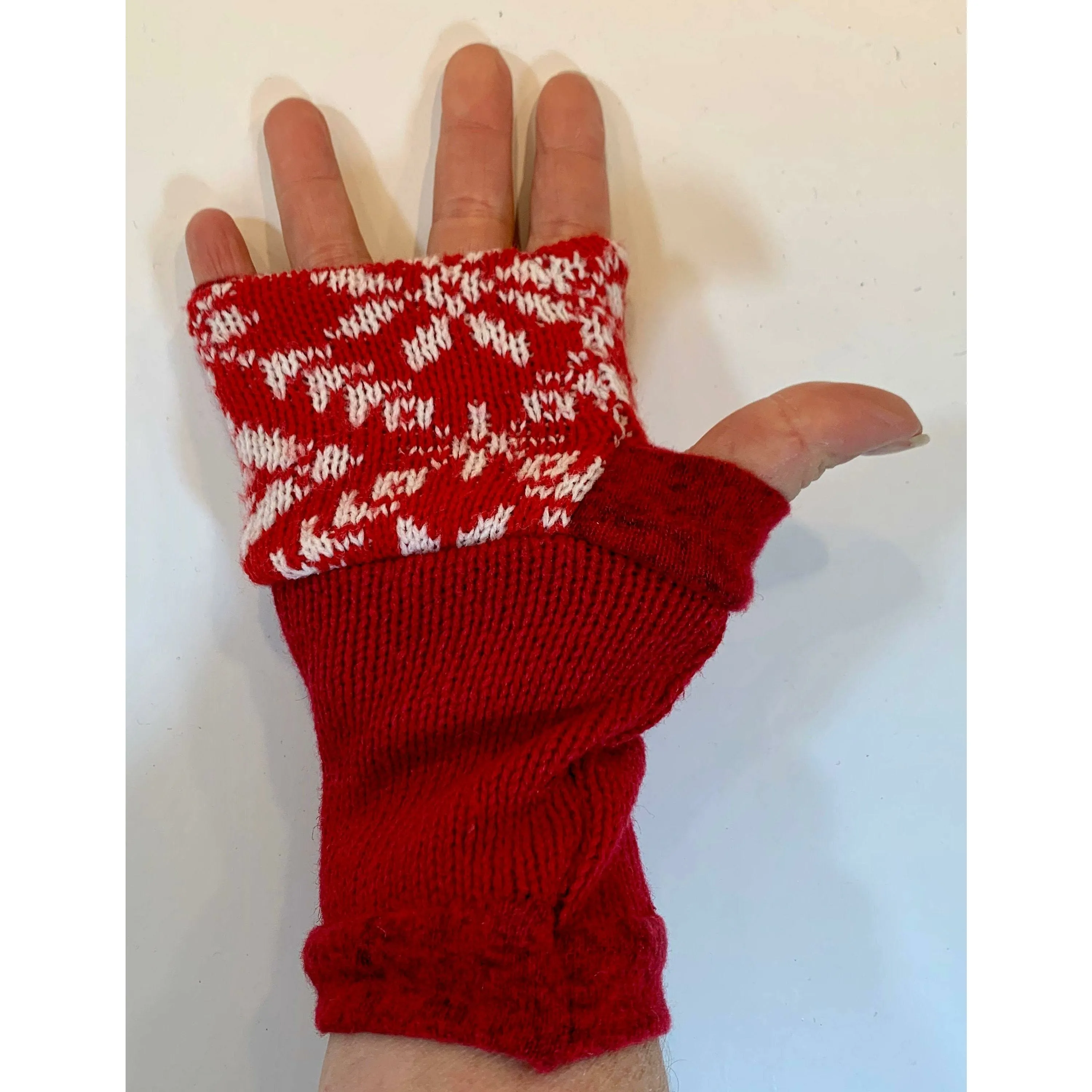 Recycled Scandinavian pattern sweater fingerless gloves in reds with embroidered snowflake. Wear for fun, school, cashiers, fingers free.