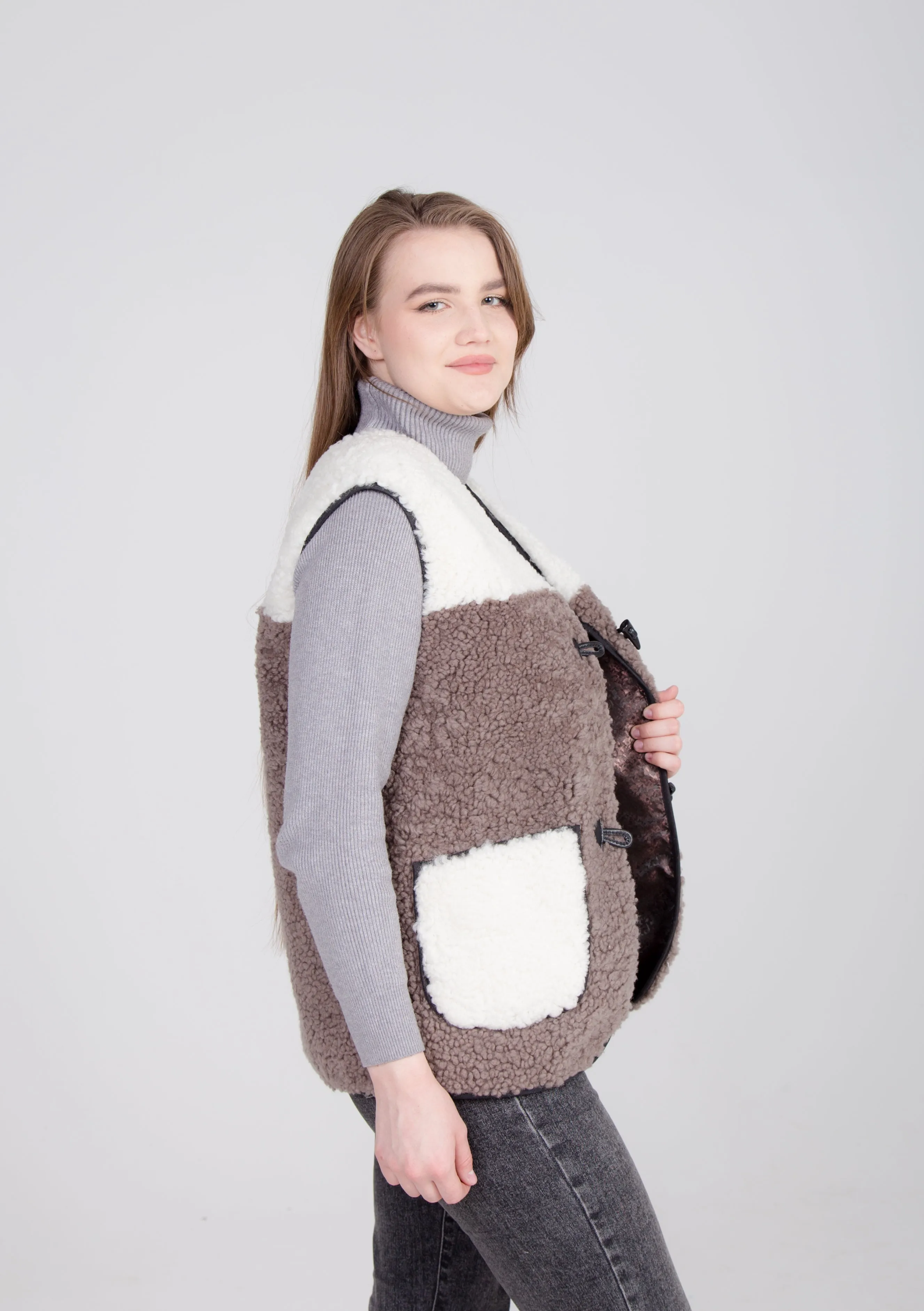 Two-Colored Brown Womens Shearling Vest with Leather Patch Buckle Buttons